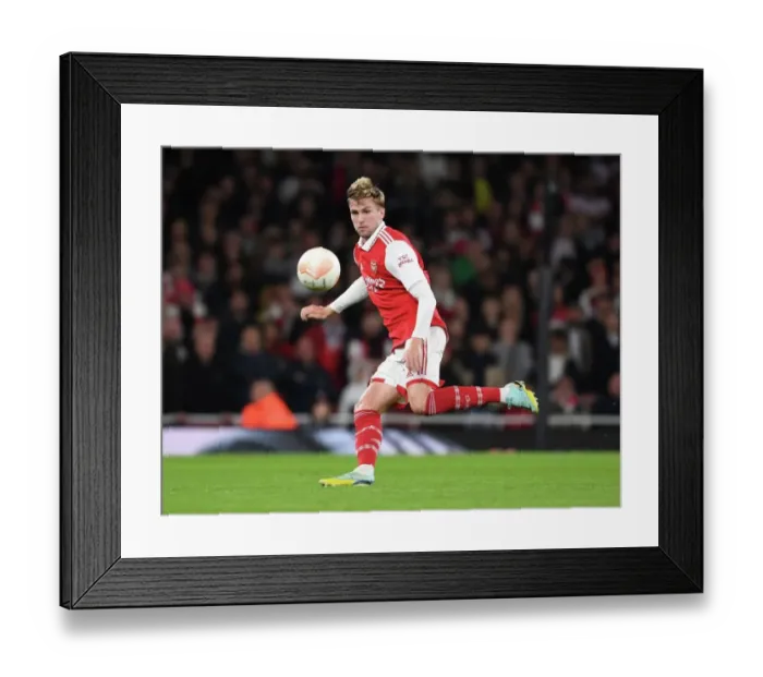 Framed Print : Arsenal vs PSV Eindhoven: Europa League Battle at Emirates Stadium