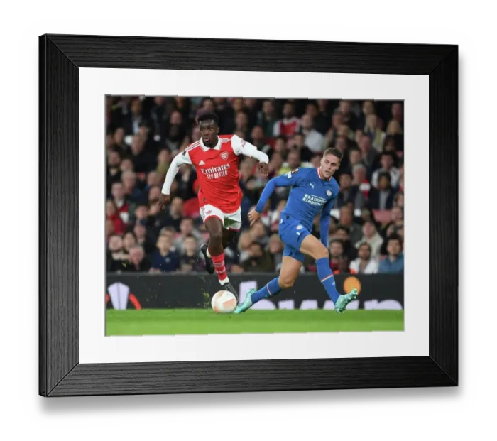 Framed Print : Arsenal's Eddie Nketiah Scores Past PSV's Joey Veerman in Europa League Clash