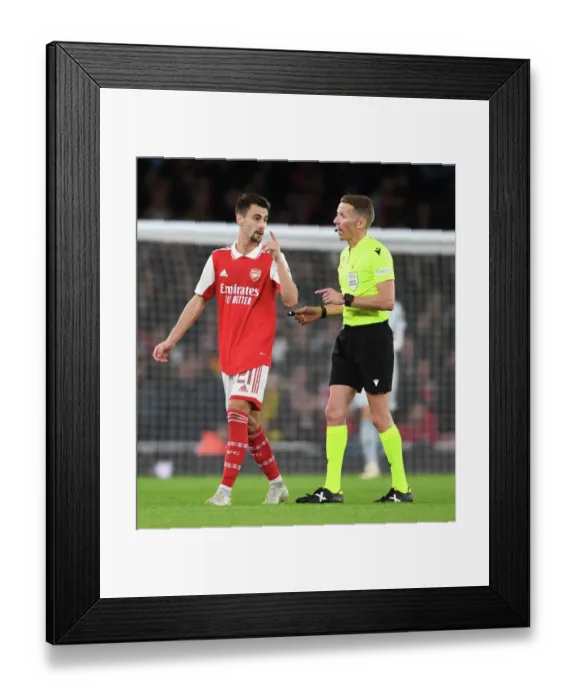 Framed Print : Arsenal vs PSV Eindhoven: Fabio Vieira Disputes Call in Europa League Clash (2022-23)