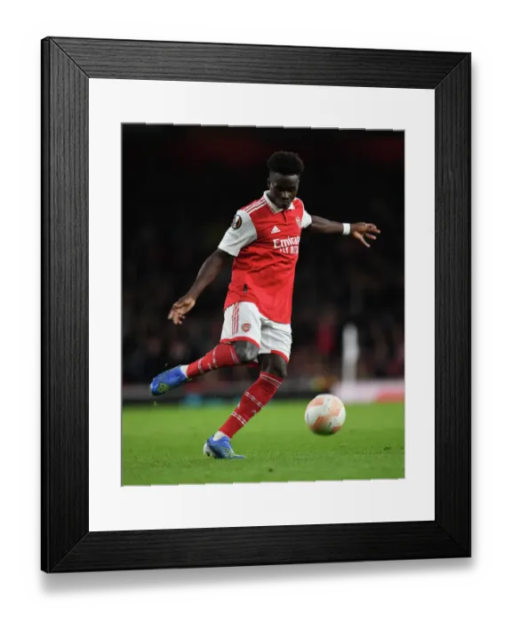 Framed Print : Bukayo Saka's Star Performance: Arsenal Triumphs Over PSV Eindhoven in Europa League 2022-23