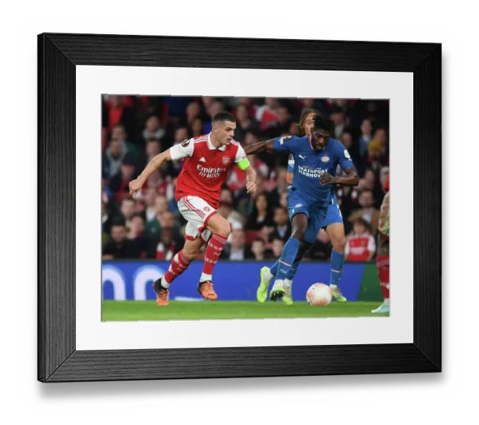 Framed Print : Granit Xhaka's Dominant Display: Arsenal Overpowers PSV Eindhoven in Europa League Framed Print : Granit Xhaka's Dominant Display: Arsenal Overpowers PSV Eindhoven in Europa League