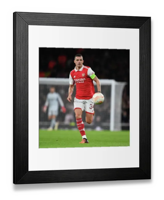 Framed Print : Granit Xhaka's Unstoppable Performance: Arsenal Claims Europa League Victory over PSV Eindhoven Framed Print : Granit Xhaka's Unstoppable Performance: Arsenal Claims Europa League Victory over PSV Eindhoven