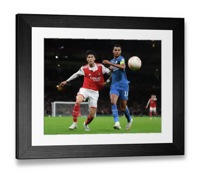 Framed Print : Arsenal vs PSV Eindhoven: Europa League Clash at Emirates Stadium Framed Print : Arsenal vs PSV Eindhoven: Europa League Clash at Emirates Stadium