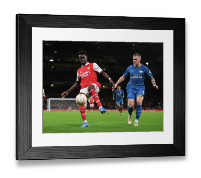Framed Print : Arsenal vs PSV Eindhoven: Bukayo Saka Clash in Europa League Group A