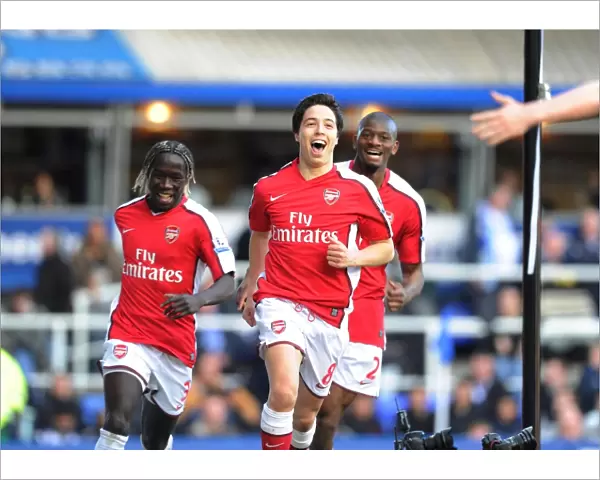 Samir Nasri shoots celebrates scoring the Arsenal goal with Bacary Sagna and Abou Diaby
