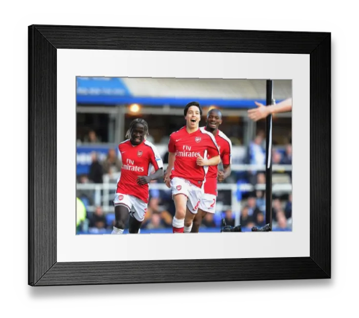 Framed Print : Samir Nasri shoots celebrates scoring the Arsenal goal with Bacary Sagna and Abou Diaby