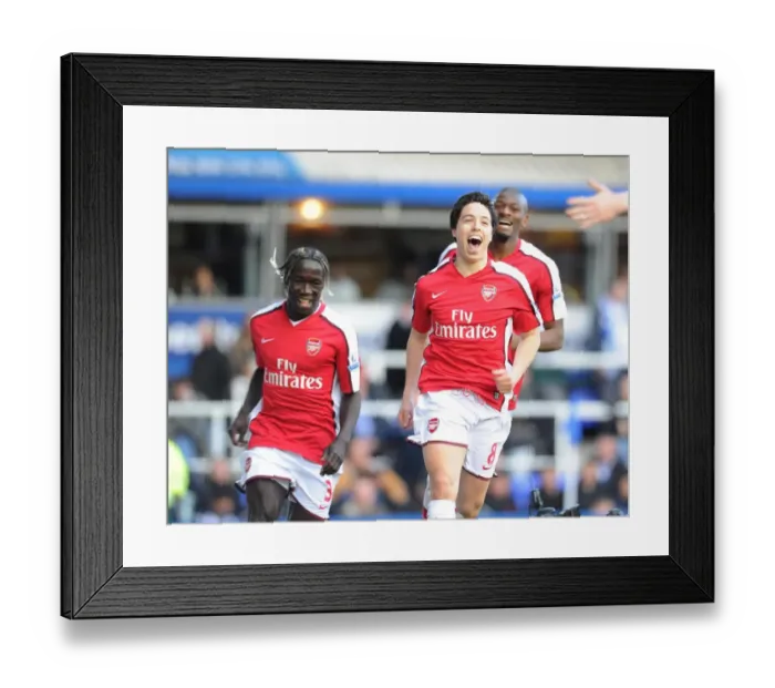 Framed Print : Triumphant Trio: Nasri, Sagna, Diaby's Unforgettable Goal Celebration vs. Birmingham City (2010)