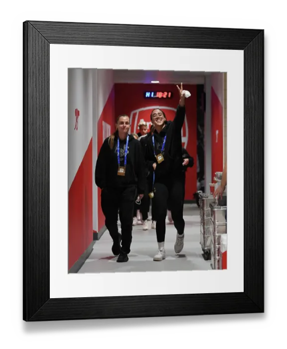Framed Print : Arsenal's Kaylan Marckese Gears Up for Champions League Battle in the Emirates Changing Room