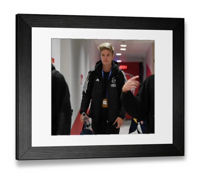 Framed Print : Arsenal Women's Champion League: Kaylan Marckese Gears Up in the Emirates Changing Room Framed Print : Arsenal Women's Champion League: Kaylan Marckese Gears Up in the Emirates Changing Room