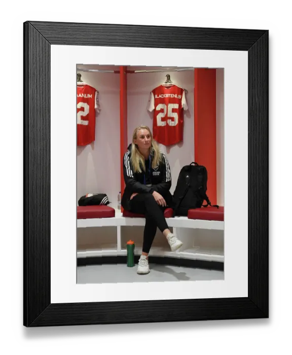Framed Print : Arsenal's Kaylan Marckese Gears Up in Emirates Stadium Changing Room Ahead of Champions League Clash