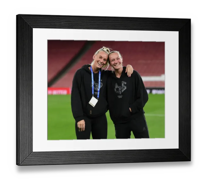 Framed Print : Arsenal's Kaylan Marckese Gears Up in Emirates Stadium Changing Room for Champions League Clash