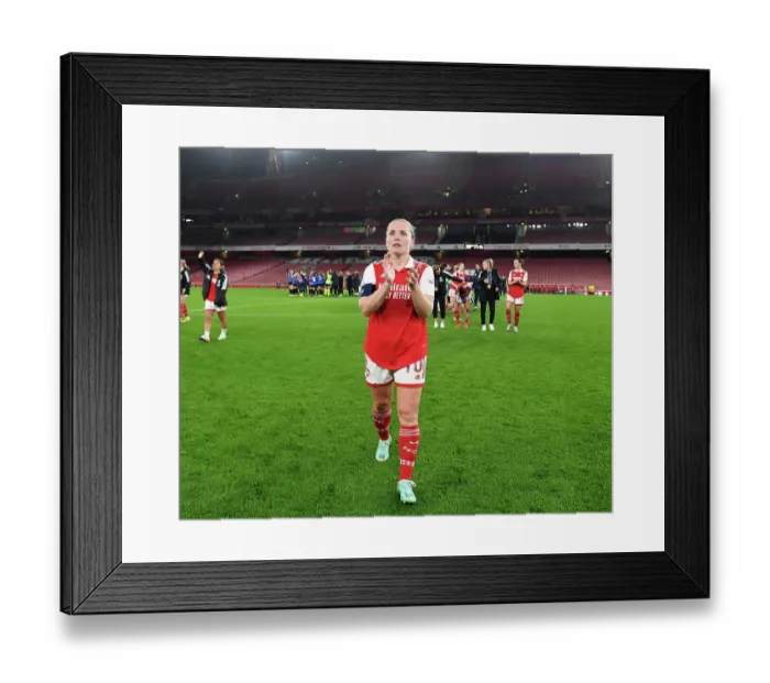 Framed Print : Arsenal Women's Champions League Victory: Kim Little Rejoices with Fans after Triumph over FC Zurich