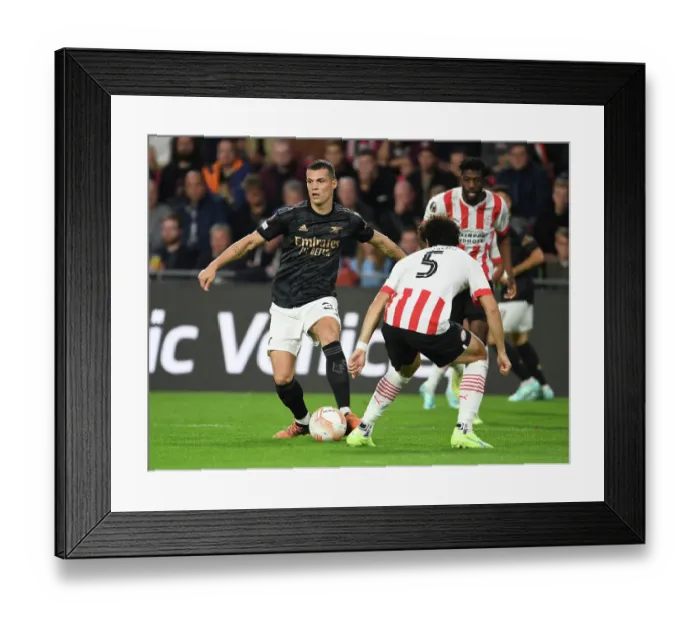 Framed Print : Granit Xhaka's Brilliant Midfield Performance: Arsenal Triumphs Over PSV Eindhoven in Europa League Framed Print : Granit Xhaka's Brilliant Midfield Performance: Arsenal Triumphs Over PSV Eindhoven in Europa League