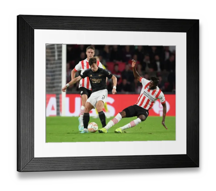 Framed Print : Arsenal's Kieran Tierney in Action against PSV Eindhoven in UEFA Europa League Group A (2022-23)