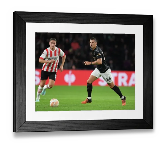 Framed Print : Granit Xhaka: Arsenal's Brilliant Midfield Performance against PSV Eindhoven in Europa League