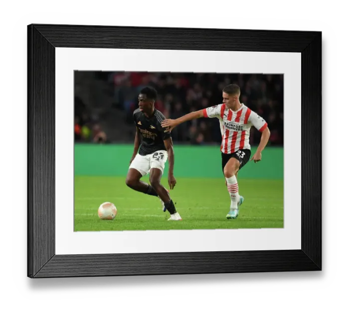 Framed Print : Arsenal's Sambi Outmaneuvers PSV's Veerman in Europa League Clash Framed Print : Arsenal's Sambi Outmaneuvers PSV's Veerman in Europa League Clash