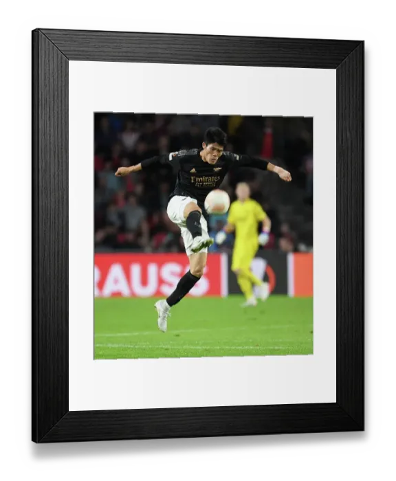 Framed Print : Arsenal's Tomiyasu Faces Off Against PSV in Europa League Group A Framed Print : Arsenal's Tomiyasu Faces Off Against PSV in Europa League Group A
