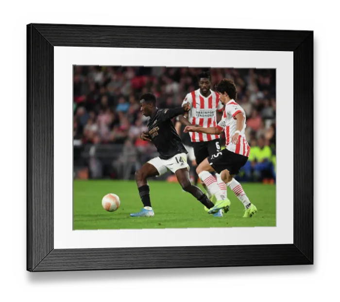 Framed Print : Arsenal's Eddie Nketiah in Europa League Action against PSV Eindhoven Framed Print : Arsenal's Eddie Nketiah in Europa League Action against PSV Eindhoven