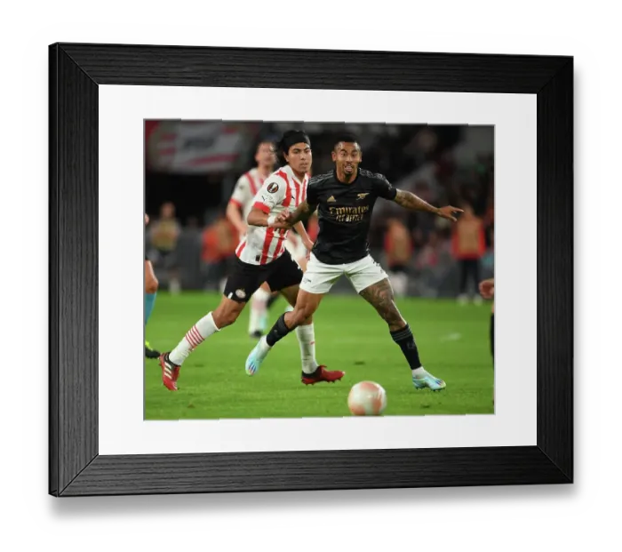 Framed Print : Gabriel Jesus Breaks Past PSV's Erick Gutierrez in Arsenal's UEFA Europa League Clash (PSV Eindhoven vs Arsenal 2022-23)