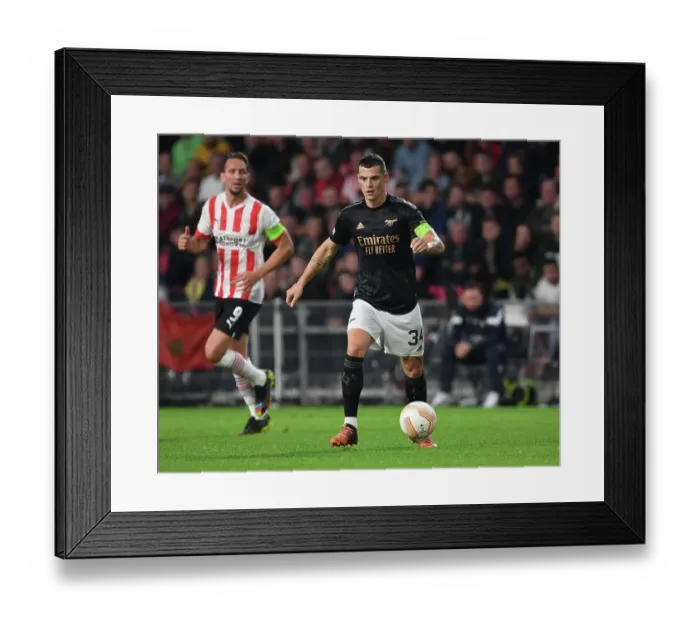 Framed Print : Granit Xhaka's Midfield Masterclass: Arsenal Claims Europa League Triumph over PSV Eindhoven Framed Print : Granit Xhaka's Midfield Masterclass: Arsenal Claims Europa League Triumph over PSV Eindhoven