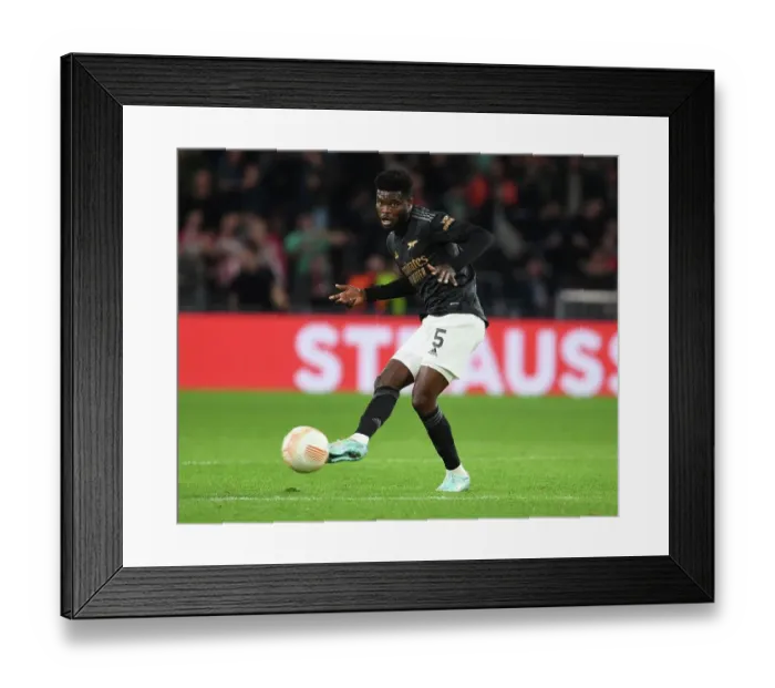 Framed Print : Thomas Partey Leads Arsenal in UEFA Europa League Clash Against PSV Eindhoven