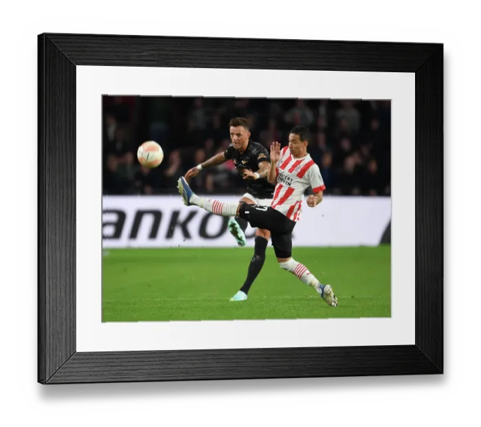 Framed Print : Arsenal's Ben White Shines in Europa League Clash Against PSV Eindhoven