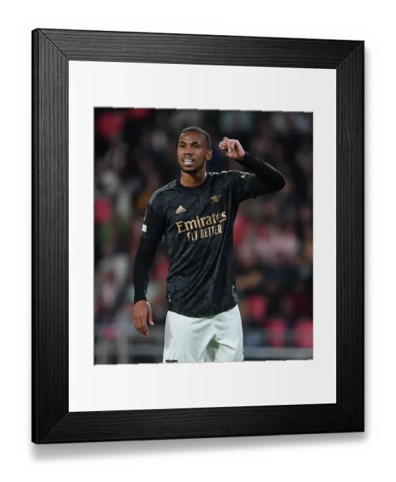 Framed Print : Arsenal's Gabriel Faces Off Against PSV Eindhoven in Europa League Clash
