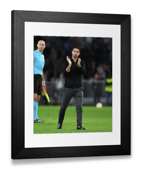 Framed Print : Arsenal's Europa League Battle: Mikel Arteta Applauds Fans After PSV Victory