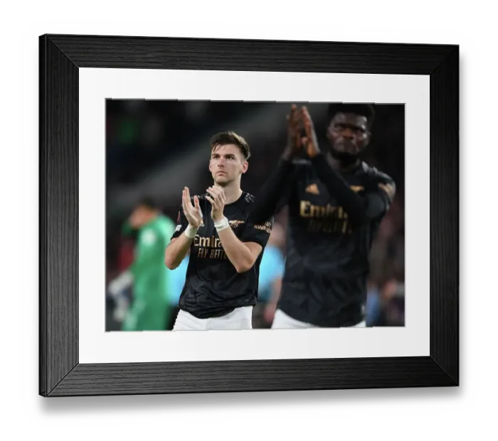 Framed Print : Arsenal's Kieran Tierney Celebrates with Fans after PSV Victory, Europa League 2022-23