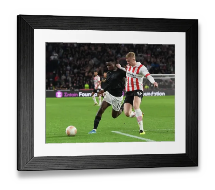 Framed Print : Eddie Nketiah vs Jarrad Branthwaite: Intense Clash in PSV Eindhoven vs Arsenal UEFA Europa League Match Framed Print : Eddie Nketiah vs Jarrad Branthwaite: Intense Clash in PSV Eindhoven vs Arsenal UEFA Europa League Match