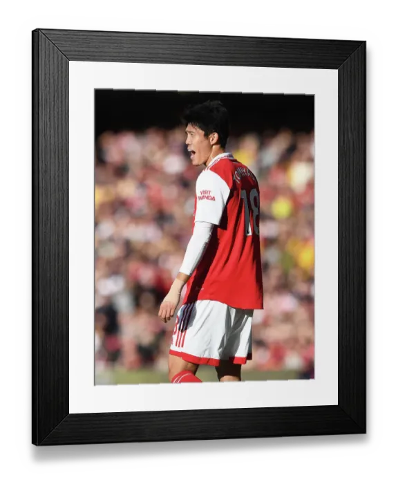 Framed Print : Arsenal's Tomiyasu in Action: Arsenal vs. Nottingham Forest (2022-23) Framed Print : Arsenal's Tomiyasu in Action: Arsenal vs. Nottingham Forest (2022-23)