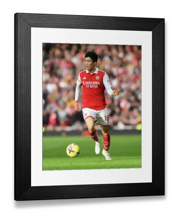 Framed Print : Tomiyasu's Breakthrough Performance: Arsenal's Triumph Over Nottingham Forest in the Premier League