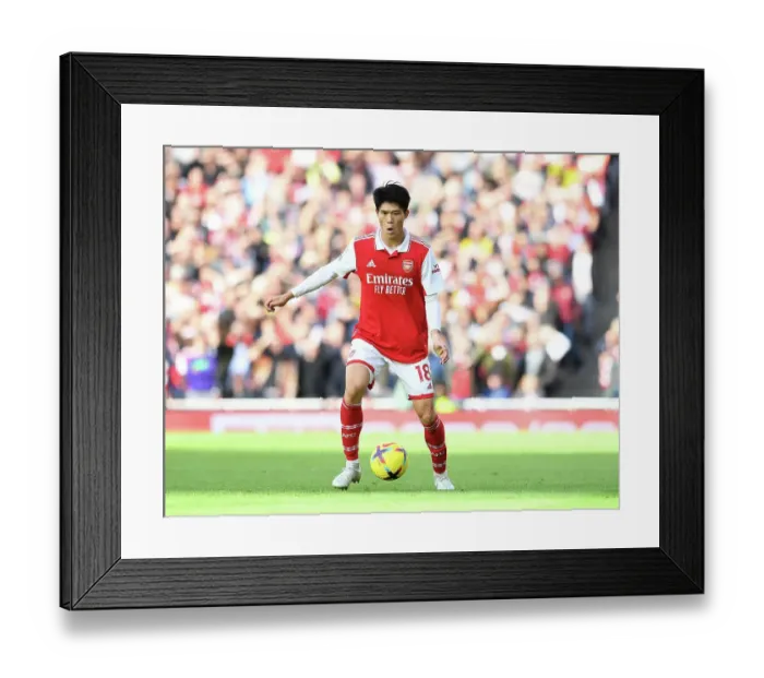 Framed Print : Arsenal's Tomiyasu in Action against Nottingham Forest (2022-23) Framed Print : Arsenal's Tomiyasu in Action against Nottingham Forest (2022-23)