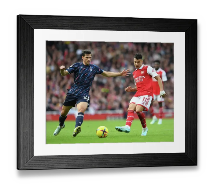 Framed Print : Arsenal vs Nottingham Forest: Gabriel Martinelli Faces Tough Challenge from Remo Freuler Framed Print : Arsenal vs Nottingham Forest: Gabriel Martinelli Faces Tough Challenge from Remo Freuler
