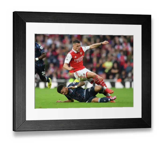 Framed Print : Arsenal vs. Nottingham Forest: Granit Xhaka Fouled by Gibbs-White in 2022-23 Premier League Clash