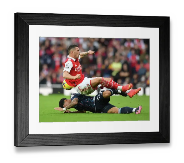 Framed Print : Arsenal vs Nottingham Forest: Granit Xhaka Fouled by Morgan Gibbs-White in 2022-23 Premier League Clash Framed Print : Arsenal vs Nottingham Forest: Granit Xhaka Fouled by Morgan Gibbs-White in 2022-23 Premier League Clash
