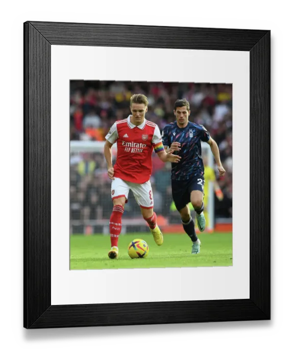 Framed Print : Martin Odegaard's Standout Display: Arsenal's Triumph Over Nottingham Forest in the Premier League
