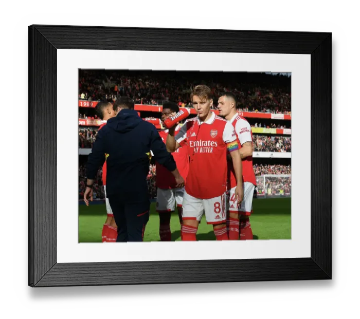 Framed Print : Arsenal's Martin Odegaard Gears Up for Arsenal v Nottingham Forest Clash (2022-23) Framed Print : Arsenal's Martin Odegaard Gears Up for Arsenal v Nottingham Forest Clash (2022-23)