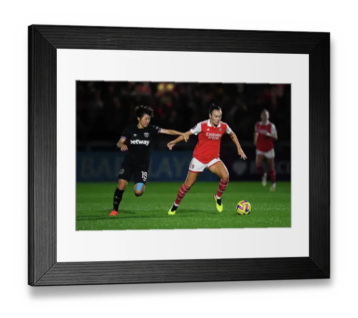 Framed Print : Arsenal vs. West Ham United: A Battle for Possession in the Barclays Womens Super League
