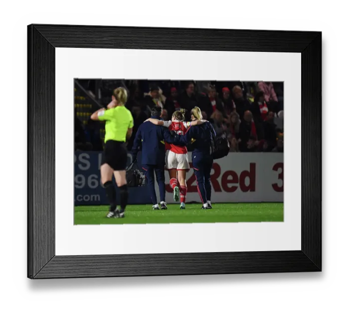 Framed Print : Arsenal's Kim Little Suffers Injury in Barclays WSL Match Against West Ham United