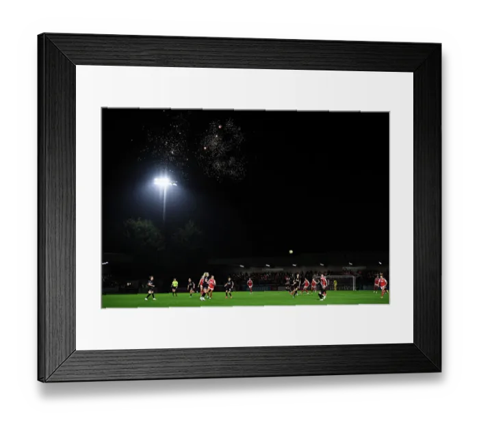 Framed Print : Arsenal vs. West Ham United: Women's Super League Clash Illuminated by Fireworks Framed Print : Arsenal vs. West Ham United: Women's Super League Clash Illuminated by Fireworks