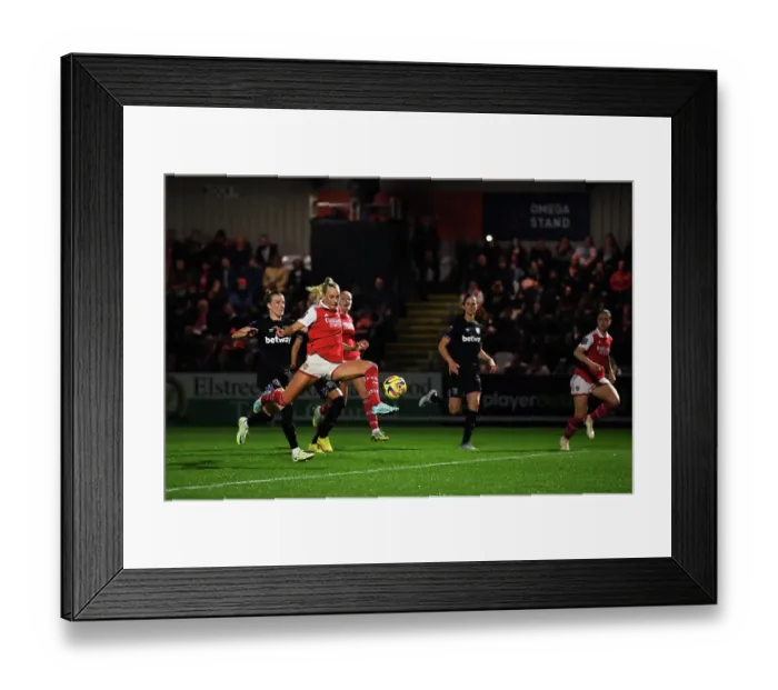 Framed Print : Arsenal Women's FA WSL: Stina Blackstenius Scores the Decisive Goal Against West Ham United Framed Print : Arsenal Women's FA WSL: Stina Blackstenius Scores the Decisive Goal Against West Ham United