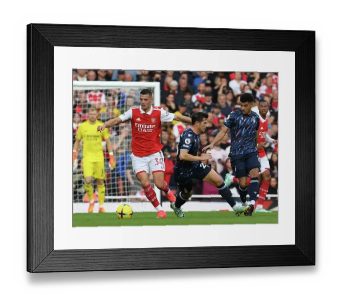 Framed Print : Granit Xhaka's Standout Midfield Display: Arsenal's Dominant Performance Against Nottingham Forest