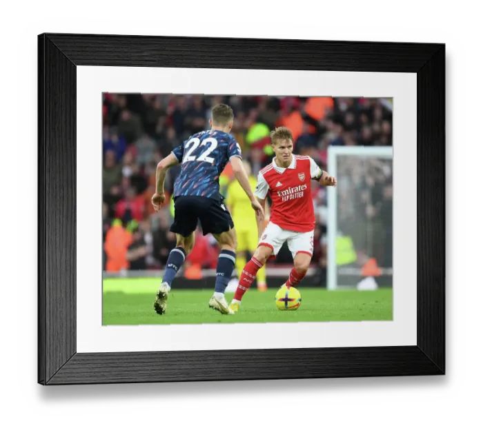 Framed Print : Martin Odegaard's Brilliant Performance: Arsenal's Triumph Over Nottingham Forest Framed Print : Martin Odegaard's Brilliant Performance: Arsenal's Triumph Over Nottingham Forest