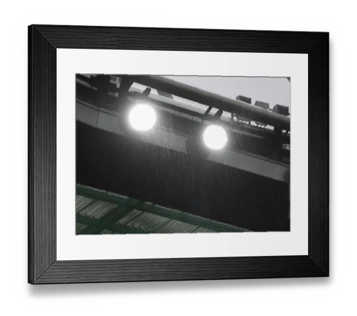 Framed Print : Rainy Premier League Showdown: Arsenal vs Nottingham Forest at Emirates Stadium