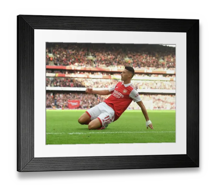 Framed Print : Martinelli's Stunner: Arsenal Secures Victory Over Nottingham Forest in Premier League Thriller