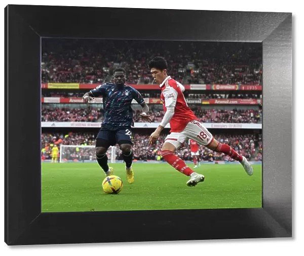 Arsenal's Tomiyasu Outruns Aurier in Premier League Clash vs. Nottingham Forest