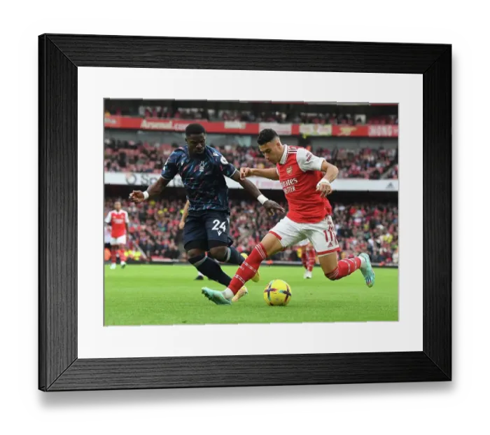 Framed Print : Arsenal vs. Nottingham Forest: Martinelli Faces Aurier in Premier League Clash (2022-23)