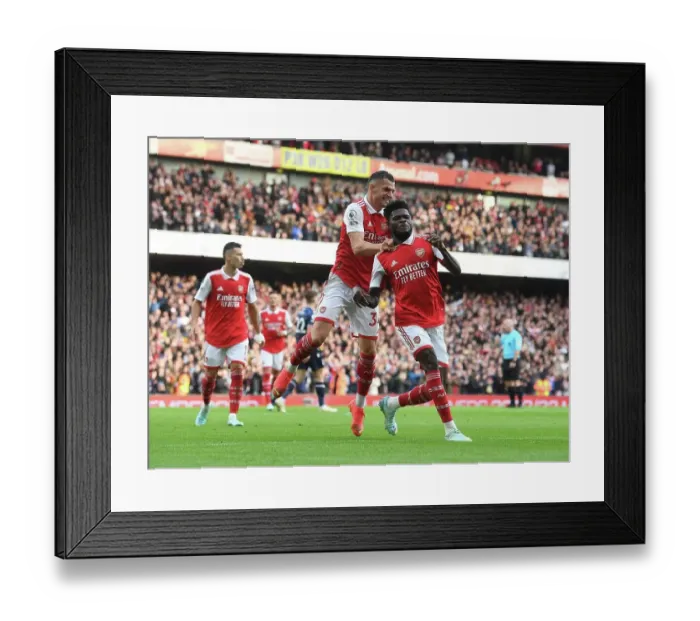 Framed Print : Partey and Xhaka Celebrate Arsenal's Four-Goal Lead Over Nottingham Forest (2022-23)