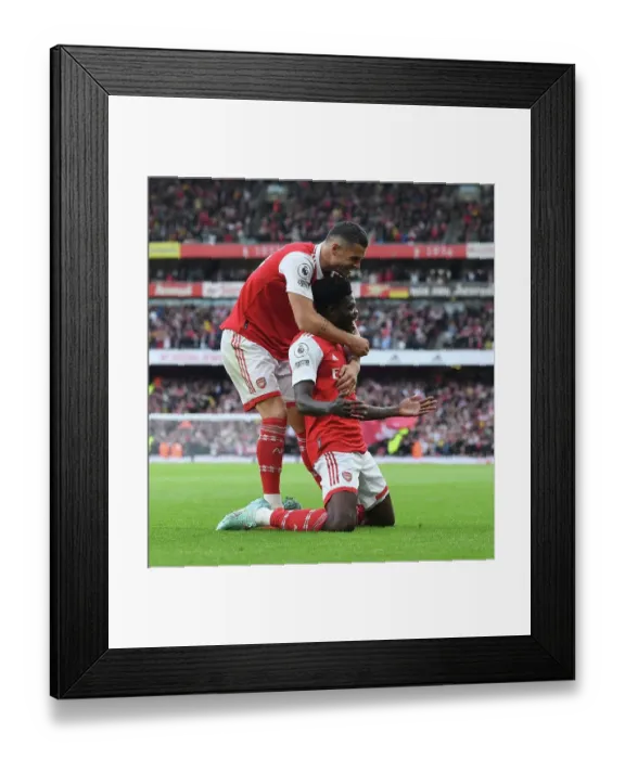 Framed Print : Partey and Xhaka Celebrate Arsenal's Fourth Goal Against Nottingham Forest (2022-23)